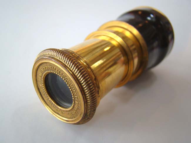 A very fine late 18th century monocular with gilt-brass mounts and tortoiseshell wrapped barrel made by "CHEVALLIER, Optician to the King" circa 1790.